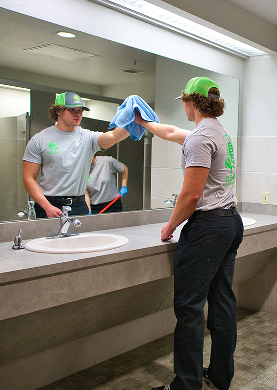 Cleaning Commercial Bathroom Mirror